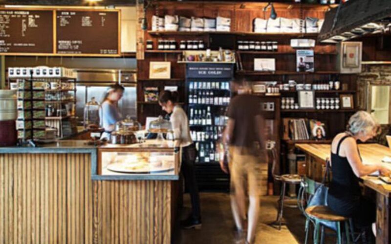 The warm wood interior of Artifact Coffee in Baltimore's Clipper Mill