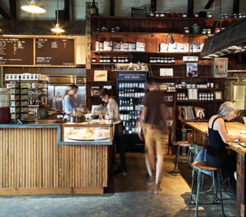 The warm wood interior of Artifact Coffee in Baltimore's Clipper Mill